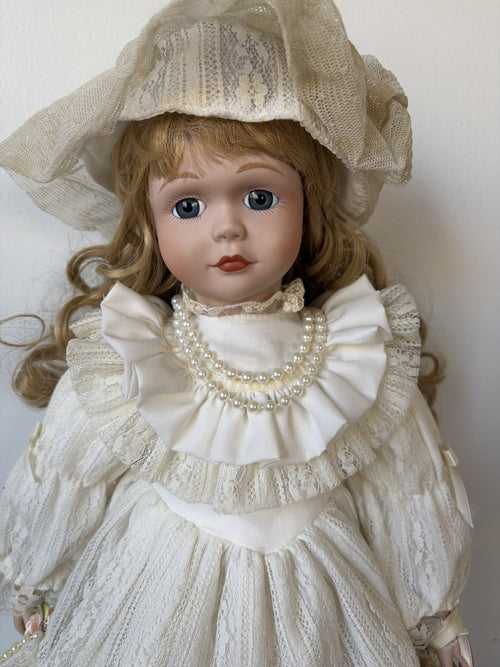 Vintage Porcelain Doll in Ivory Lace Dress with Blonde Curls