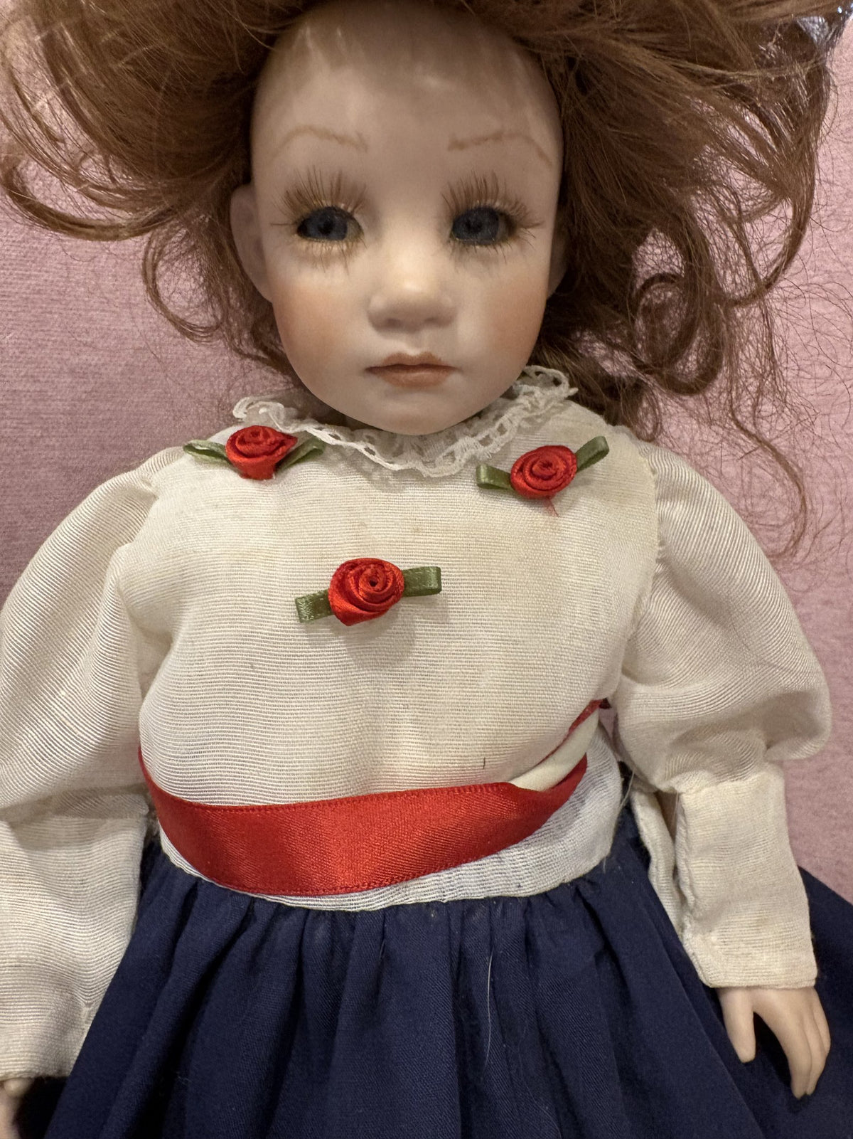 Vintage Porcelain Doll with Red Hair and Floral Dress