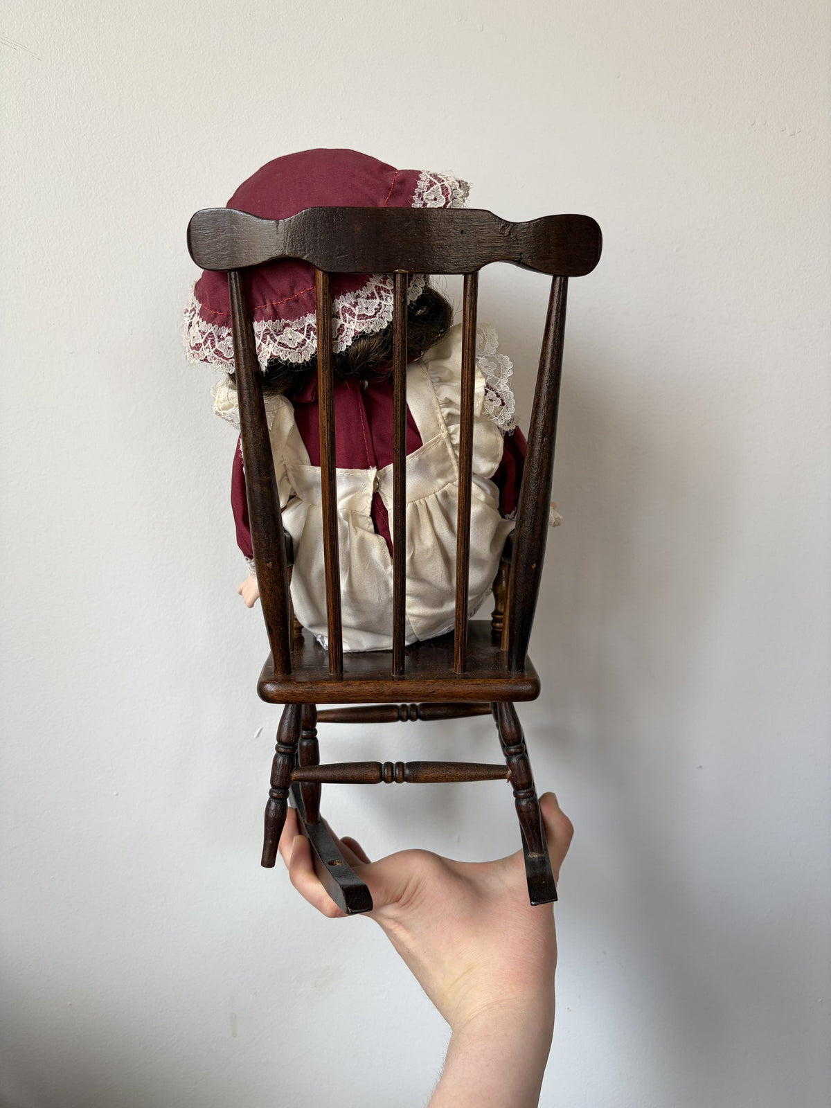 Vintage Porcelain Doll in Maroon Dress with Lace Trim