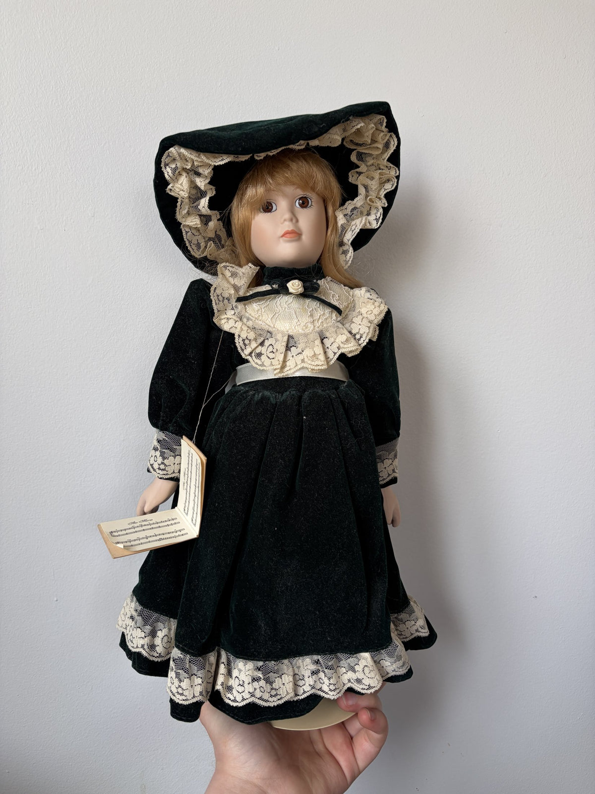 Ave Maria Porcelain Doll with Green Velvet Dress and Lace Trim