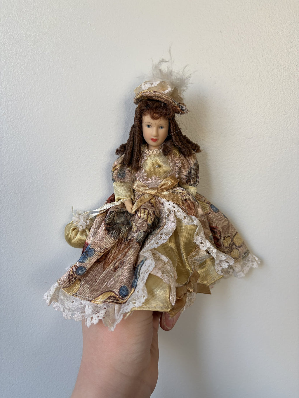 Vintage Porcelain Doll Collection in Victorian Dresses with Lace and Hats