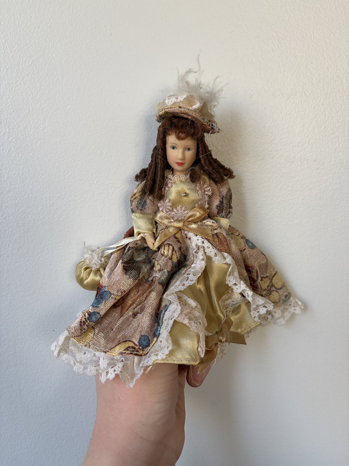 Vintage Porcelain Doll Collection in Victorian Dresses with Lace and Hats