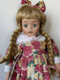 Porcelain Doll – Blonde Hair, Green Eyes, Floral Dress