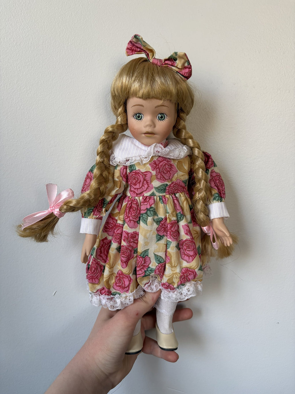 Porcelain Doll – Blonde Hair, Green Eyes, Floral Dress