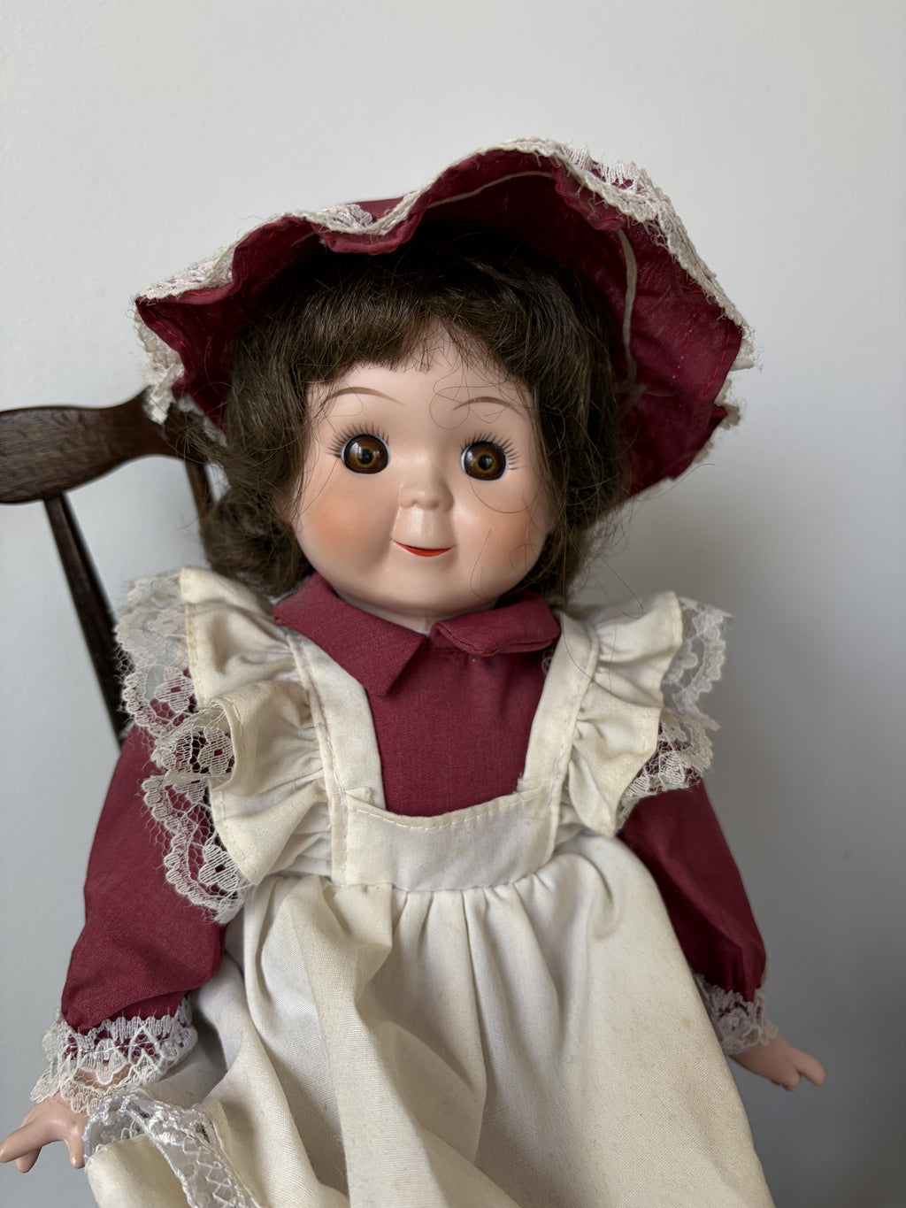 Vintage Porcelain Doll in Maroon Dress with Lace Trim