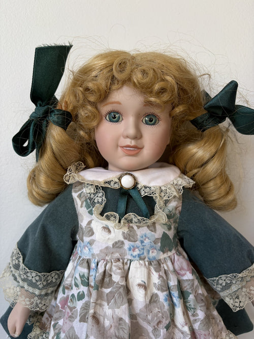 Blonde Curly Hair Porcelain Doll in Green Floral Dress 16″