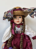 Heritage Mint Porcelain Doll with Braided Hair and Hat