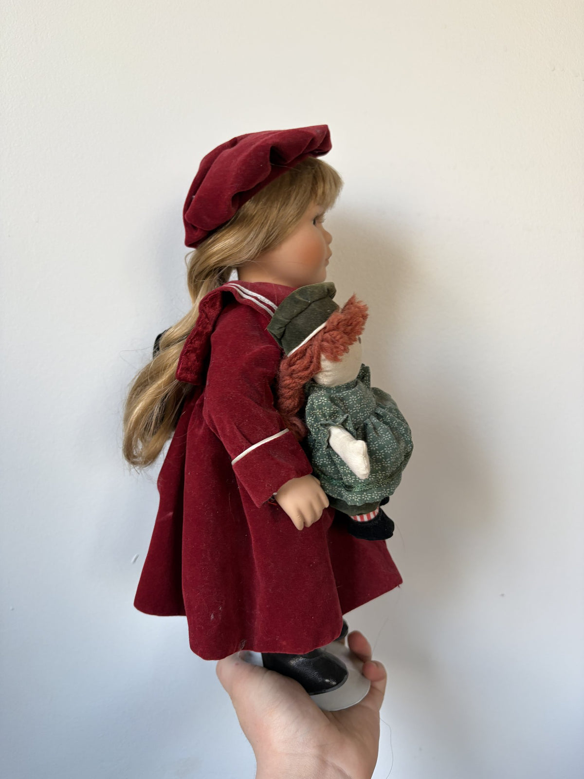 Porcelain Doll in Burgundy Outfit with Doll Accessory