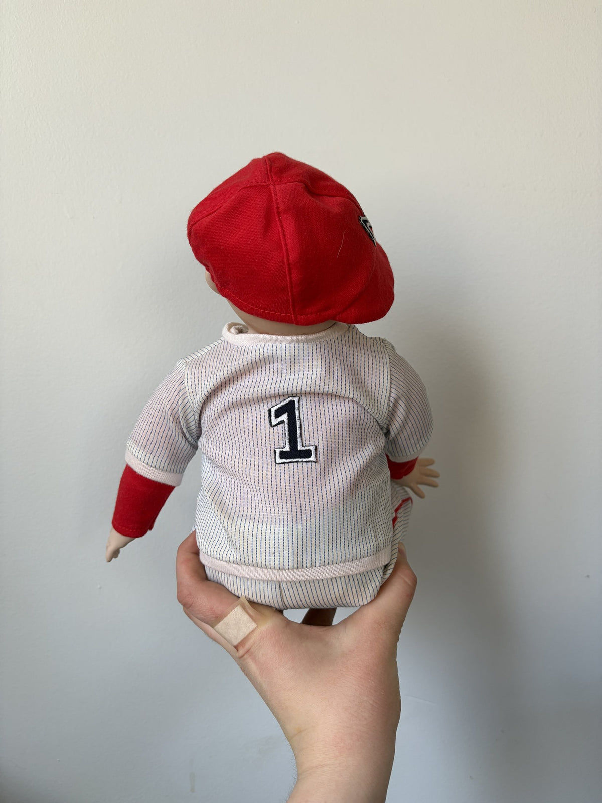 Porcelain Baseball Doll with Red Cap and Ball