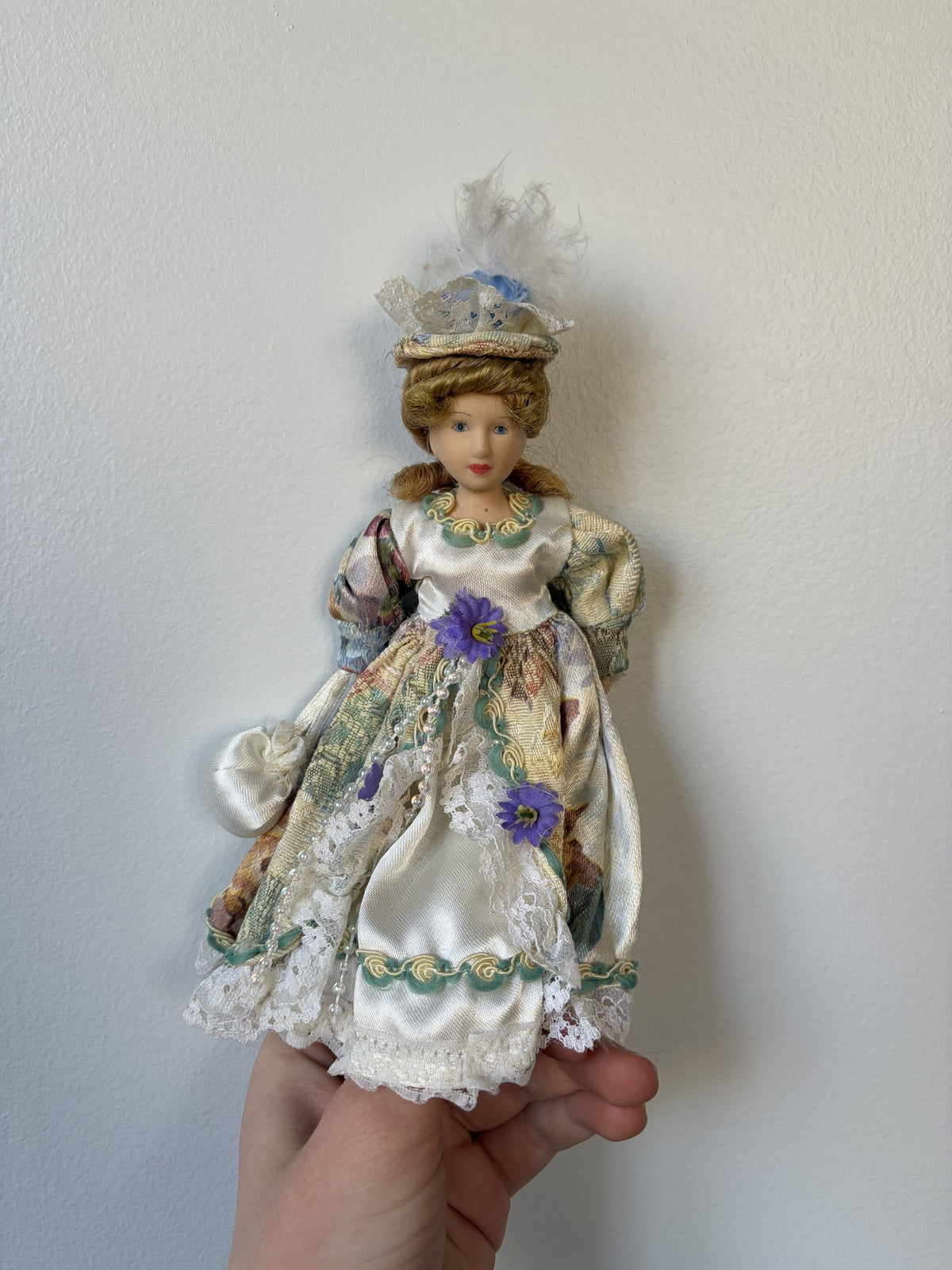 Vintage Porcelain Doll Collection in Victorian Dresses with Lace and Hats