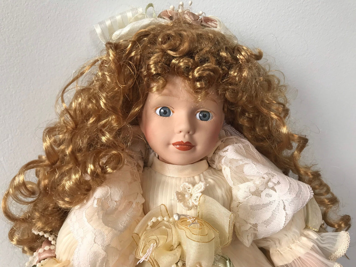 Vintage Porcelain Doll — Cream Lace Gown with Golden Ringlets