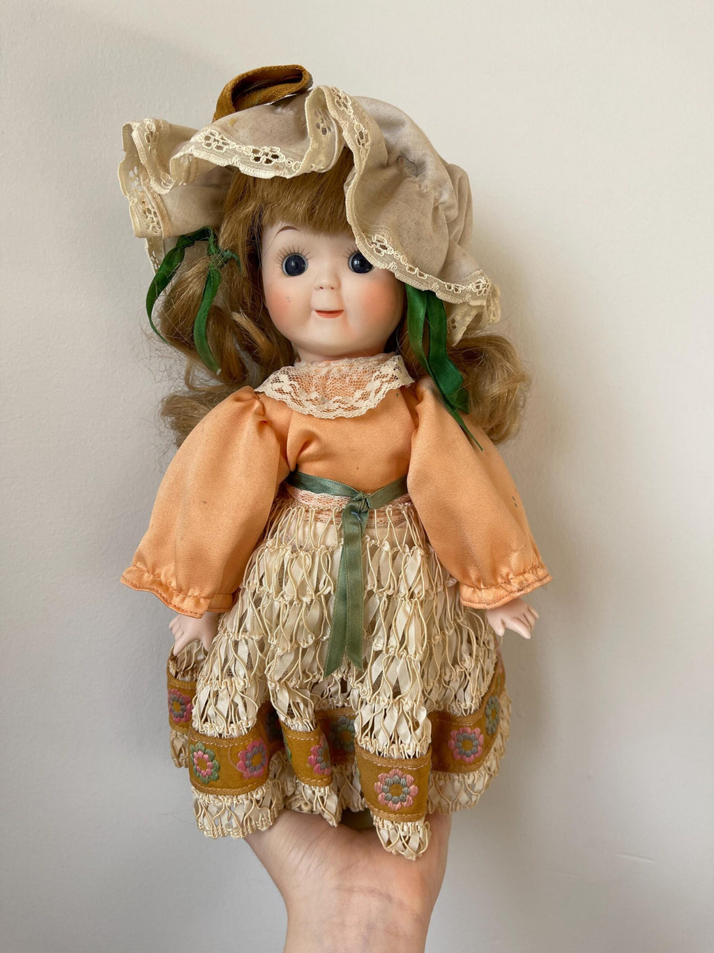“Make a Circle” Music Box Porcelain Doll — Peach Satin & Lace