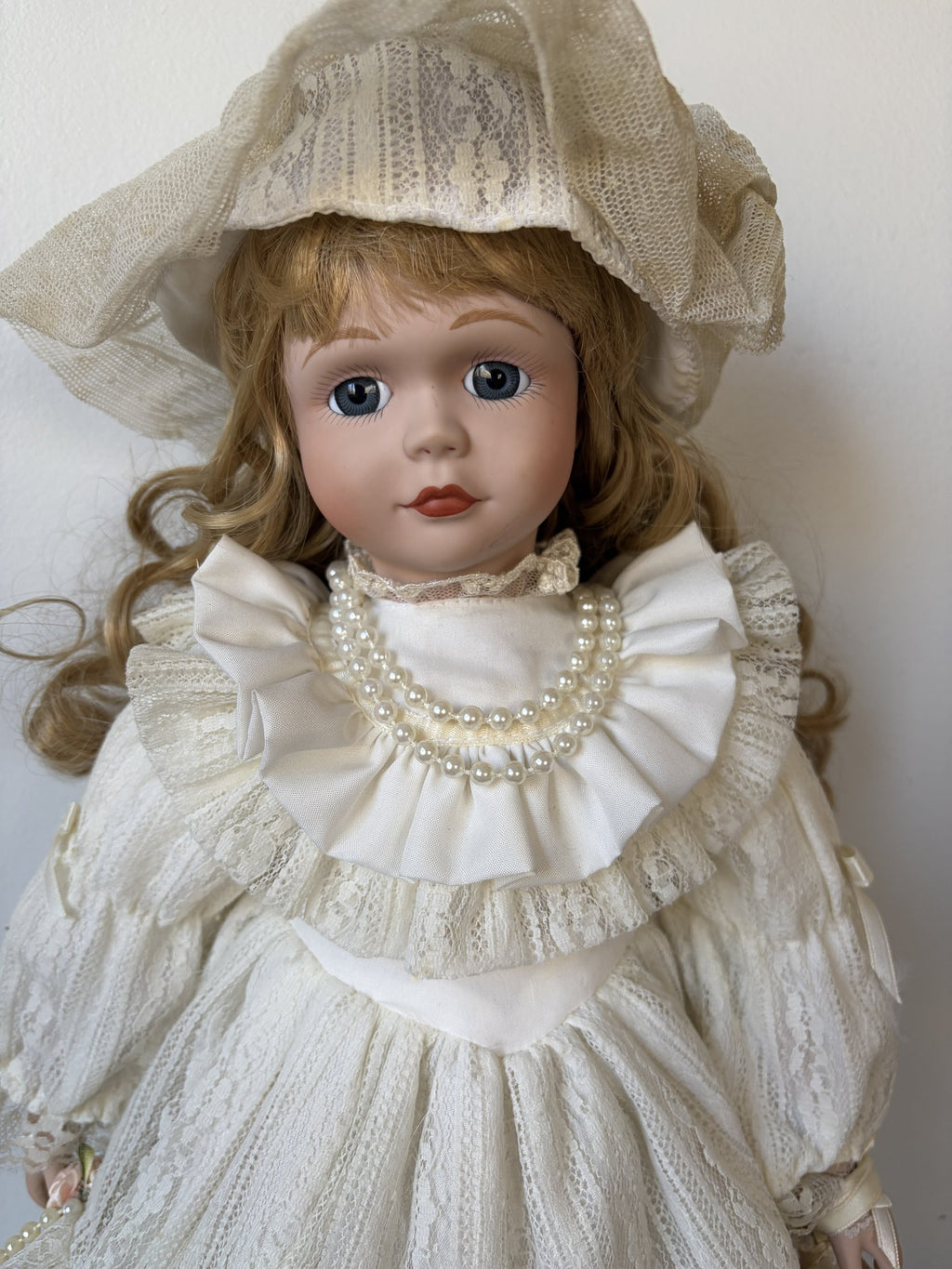 Vintage Porcelain Doll in Ivory Lace Dress with Blonde Curls