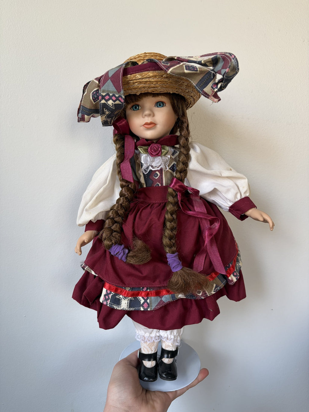 Heritage Mint Porcelain Doll with Braided Hair and Hat