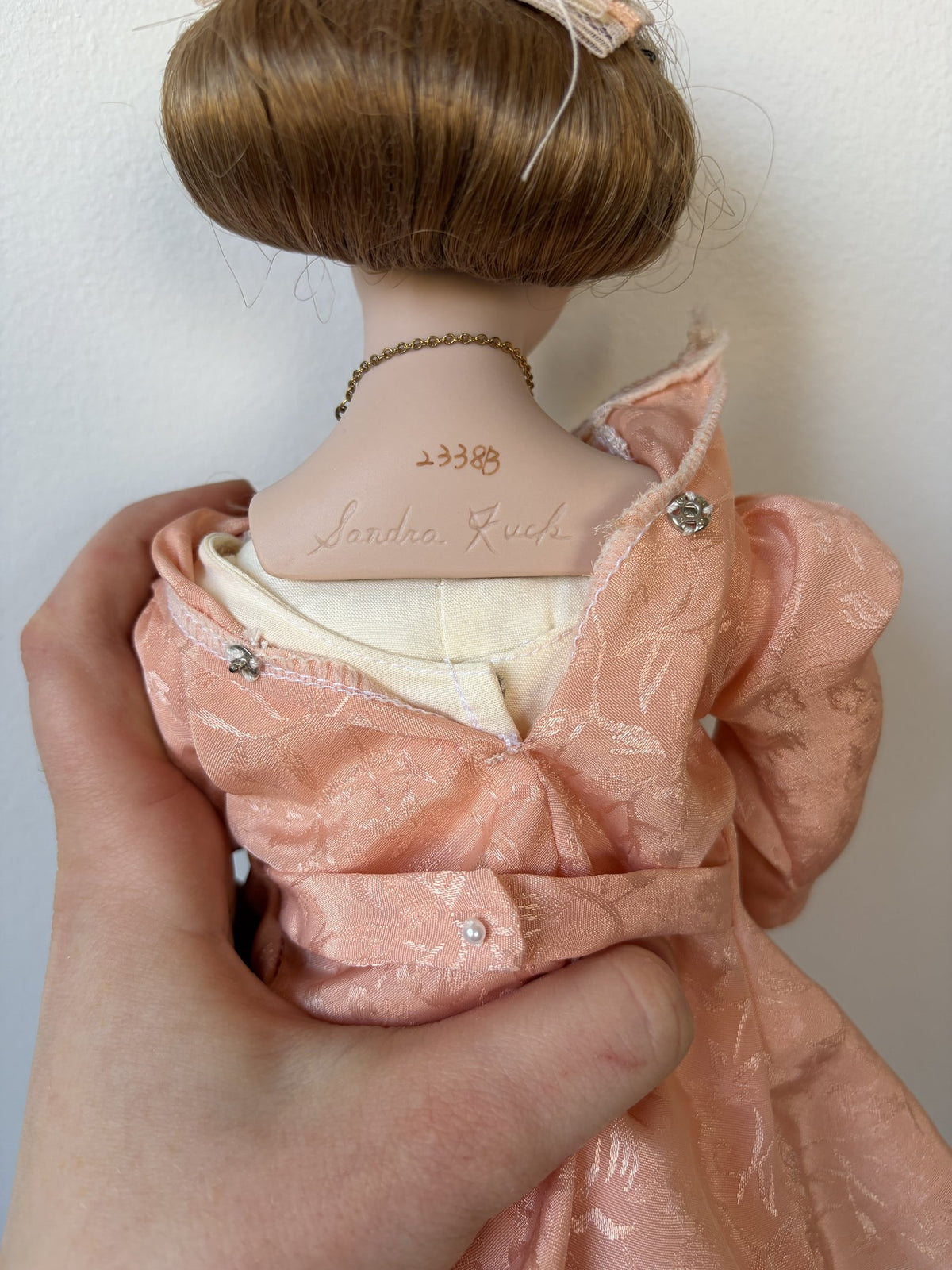 Porcelain Doll in Pink Lace Dress with Brown Hair and Blue Eyes