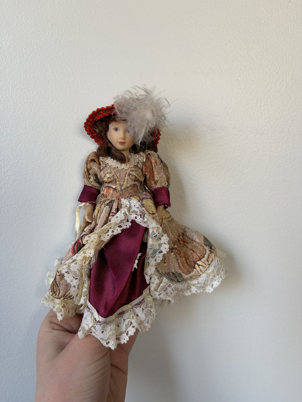 Vintage Porcelain Doll Collection in Victorian Dresses with Lace and Hats