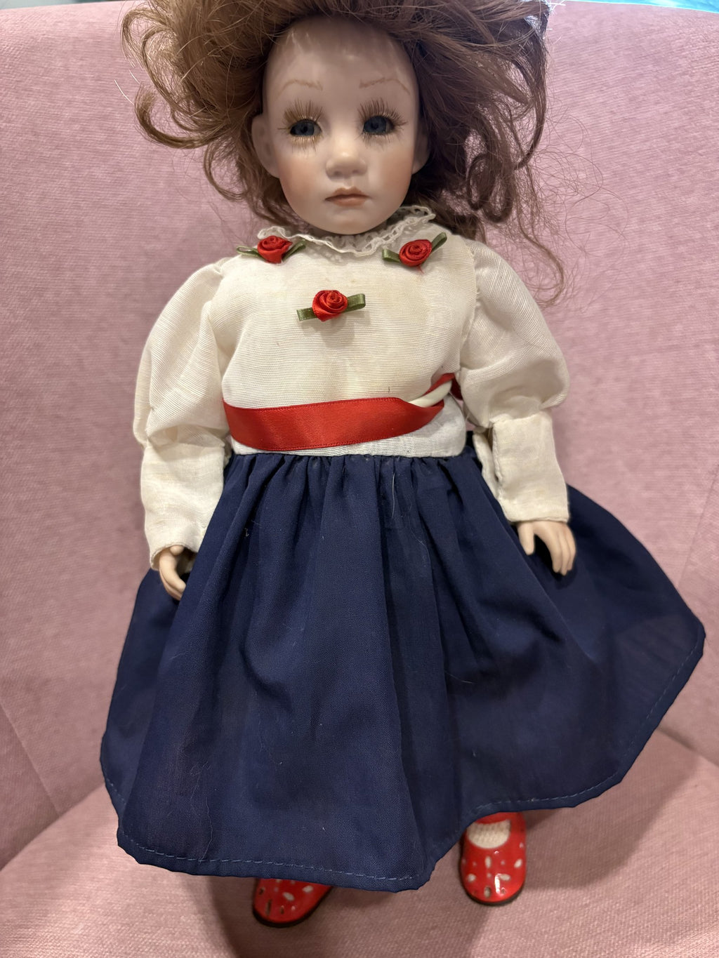 Vintage Porcelain Doll with Red Hair and Floral Dress