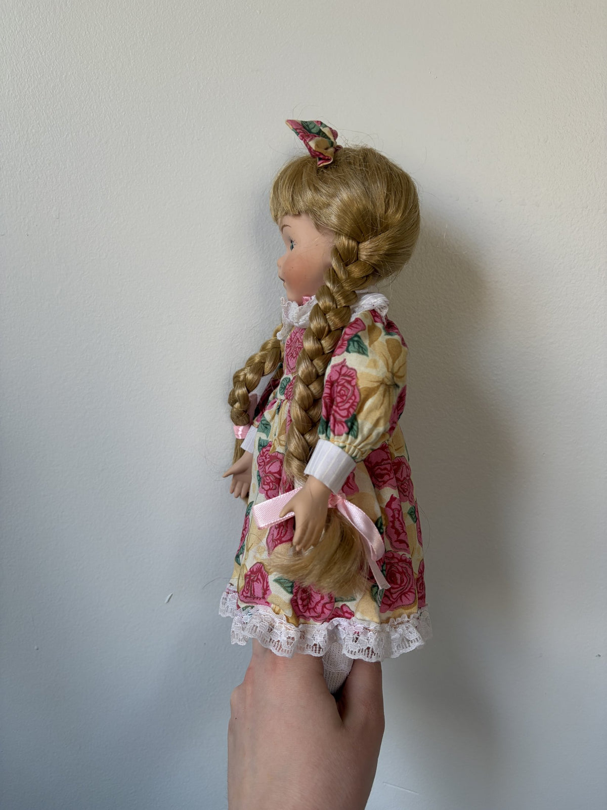 Porcelain Doll – Blonde Hair, Green Eyes, Floral Dress
