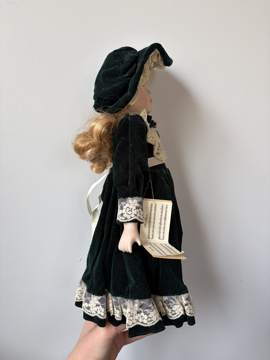 Ave Maria Porcelain Doll with Green Velvet Dress and Lace Trim