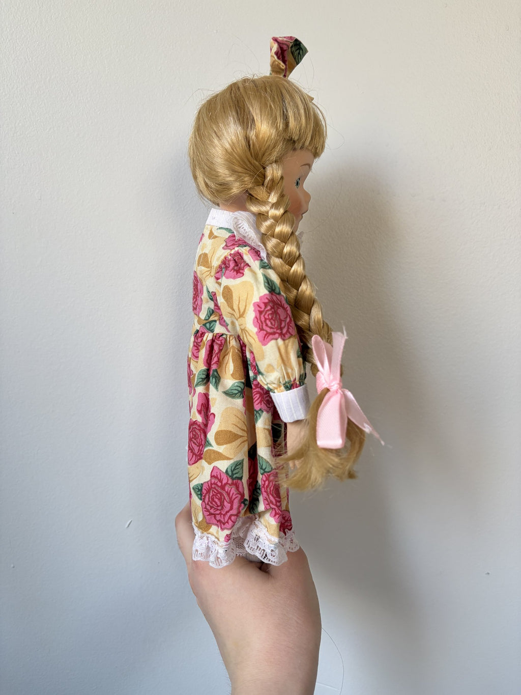 Porcelain Doll – Blonde Hair, Green Eyes, Floral Dress