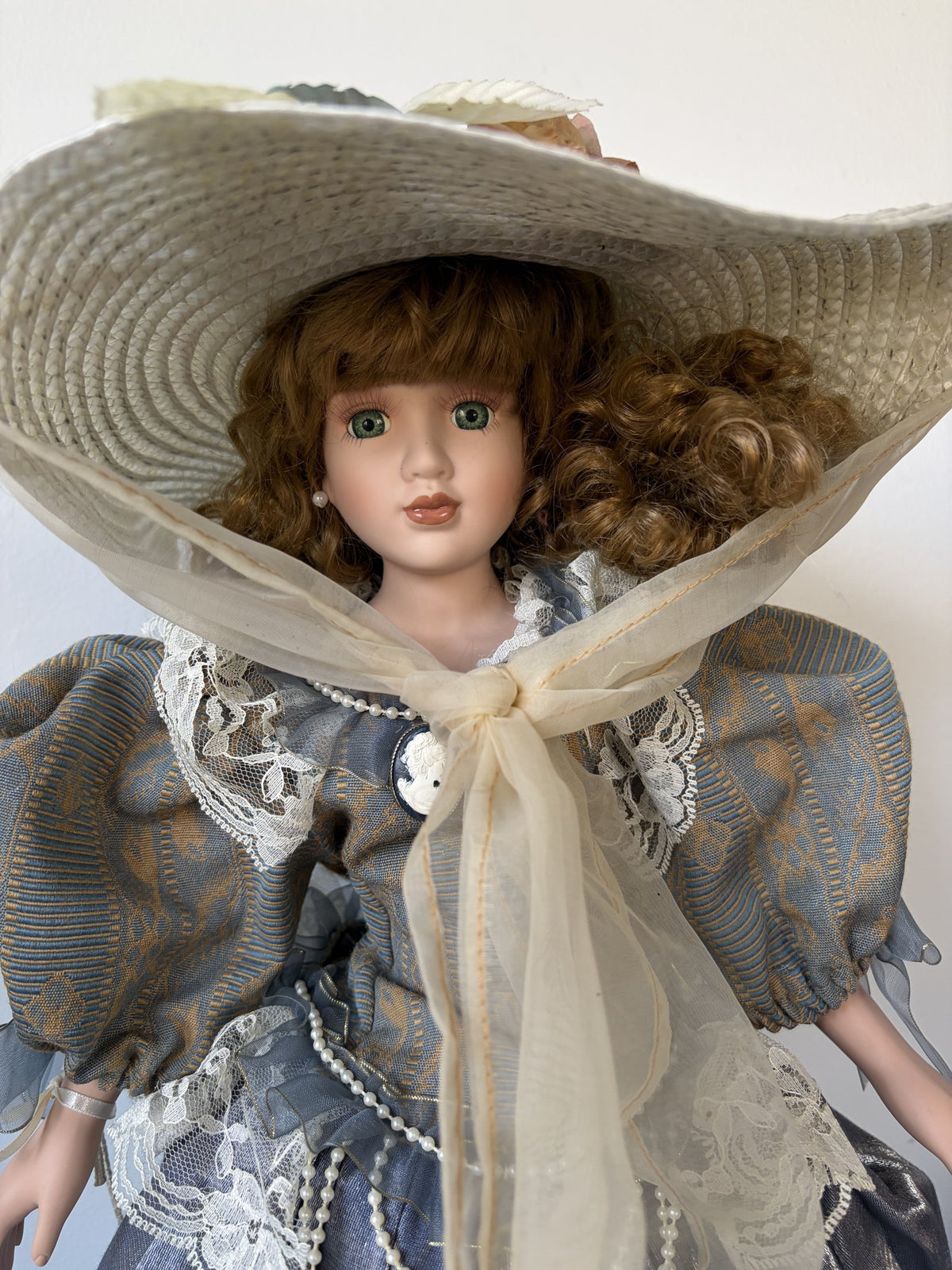 Porcelain Doll with Hat and Lace Dress