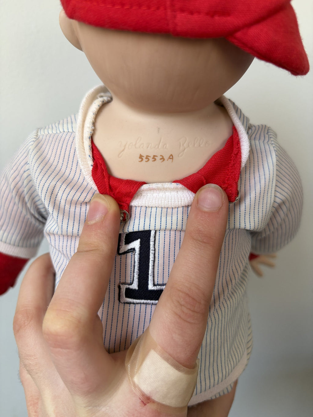 Porcelain Baseball Doll with Red Cap and Ball