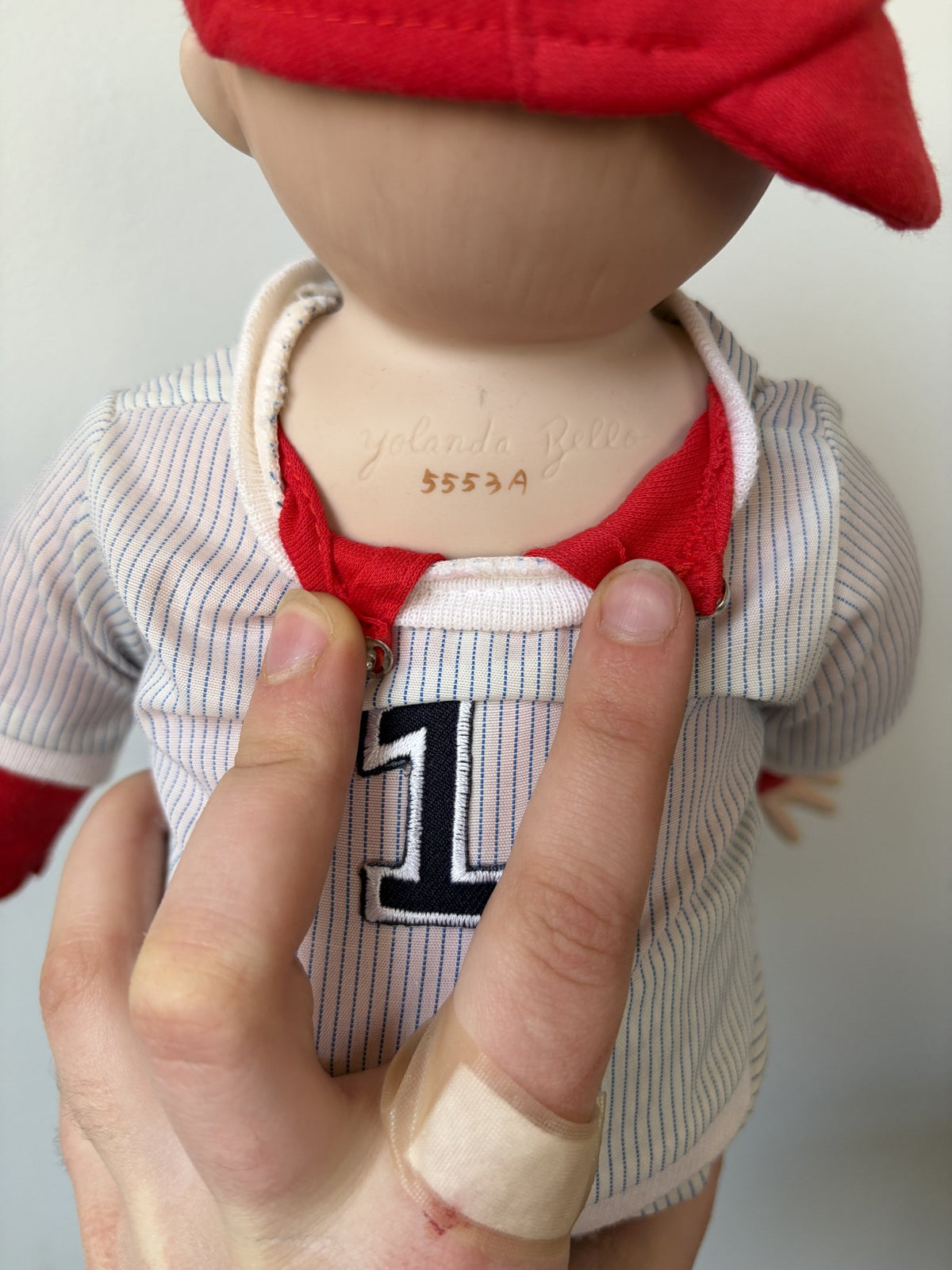 Porcelain Baseball Doll with Red Cap and Ball