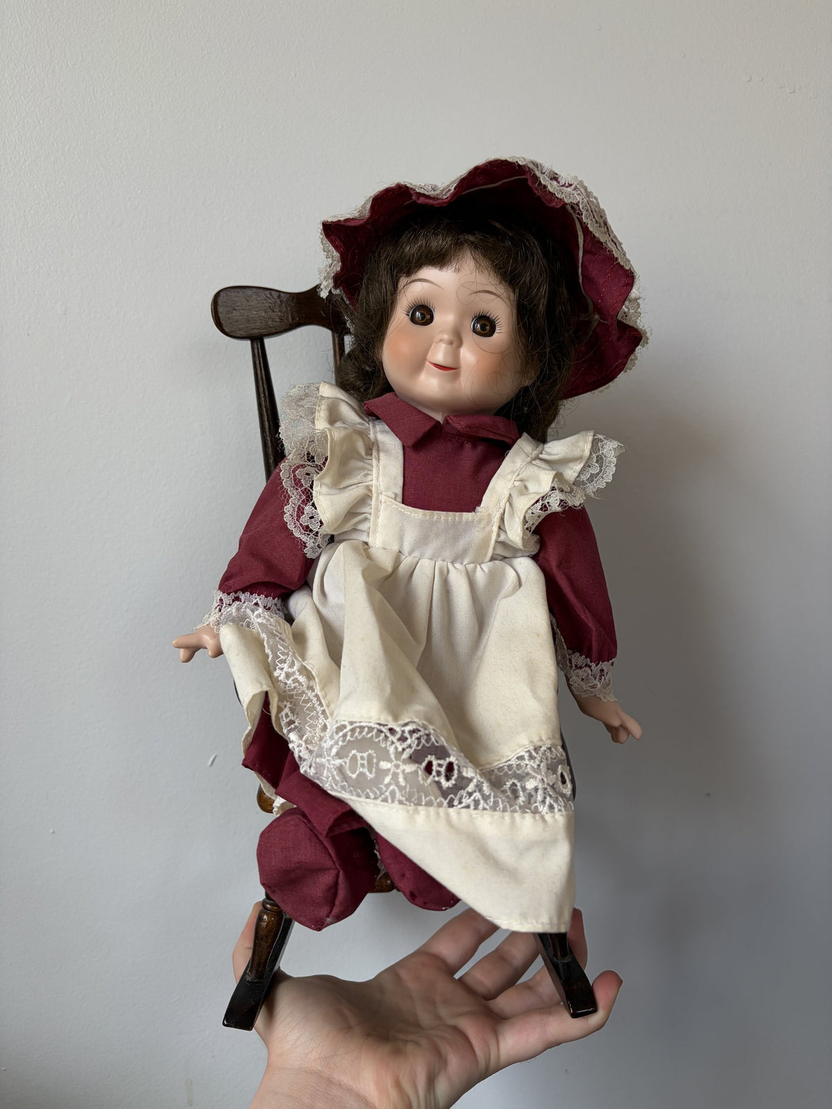 Vintage Porcelain Doll in Maroon Dress with Lace Trim