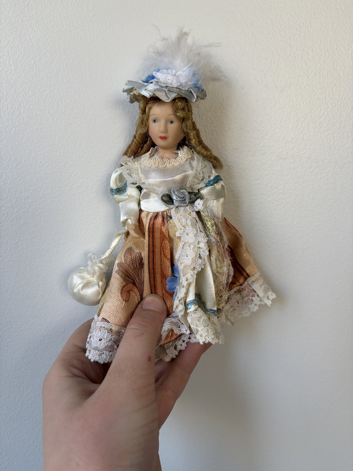 Vintage Porcelain Doll Collection in Victorian Dresses with Lace and Hats